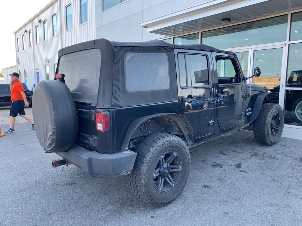 Pre-Owned 2013 Jeep Wrangler Unlimited Sport 4D Sport Utility in Paris